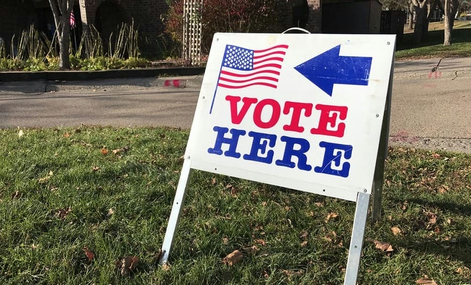 A lawn sign saying
